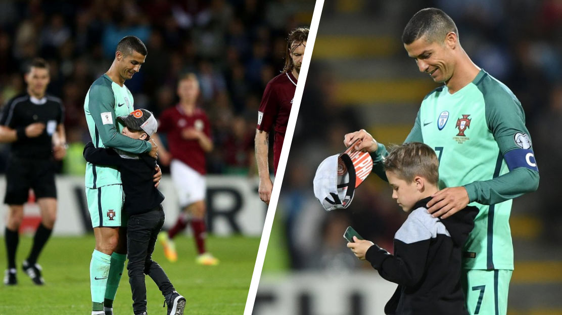 Malý fanúšik z Lotyšska vtrhol na ihrisko počas zápasu s Portugalskom a objal Cristiana Ronalda! (VIDEO)